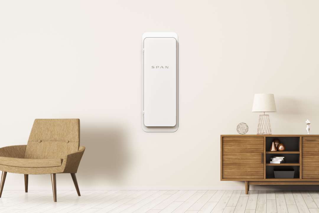 A smart home electrician from Bright Haven Electric installing a SPAN panel.